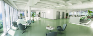 Visualisierung des des Eingangsbereichs im BioTic Office mit grünem Boden und modernen Sitzgelgenheiten